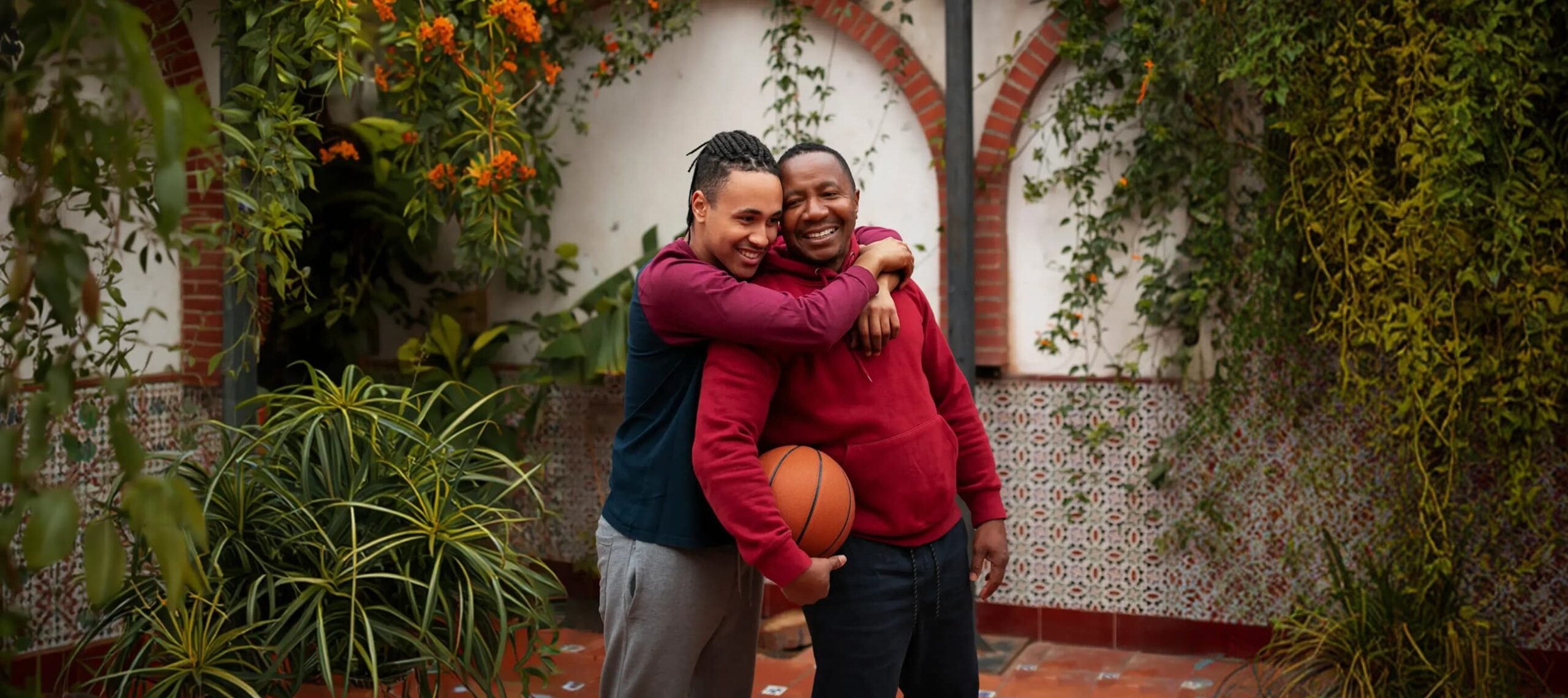 father and son hugging